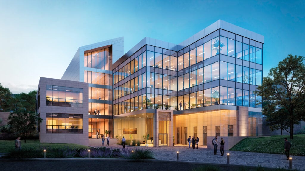 image of the exterior of a large glass building showcasing glass building products