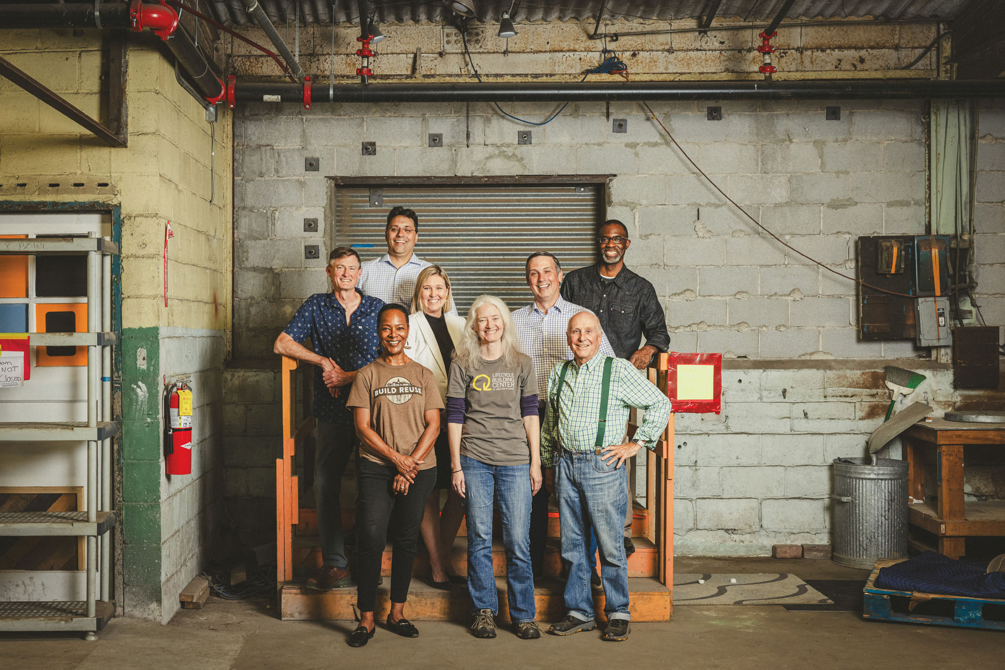 image of a group of people standing in a warehouse