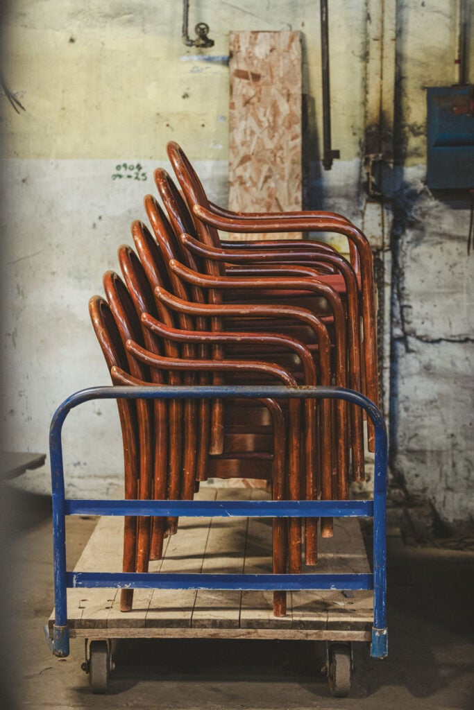 image of a stack of chairs on a dolly