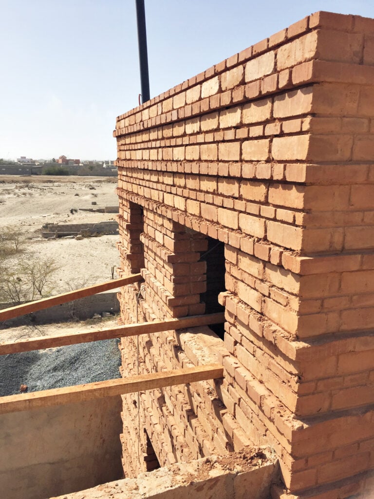 image of a building made with compressed earth bricks