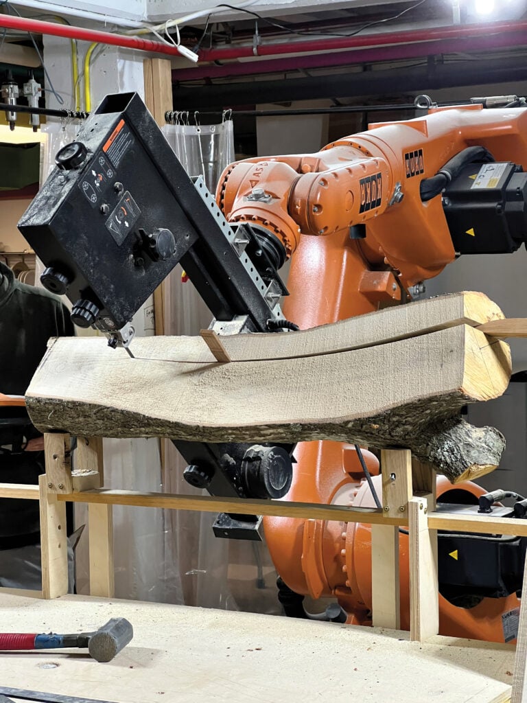 image of a machine cutting wood