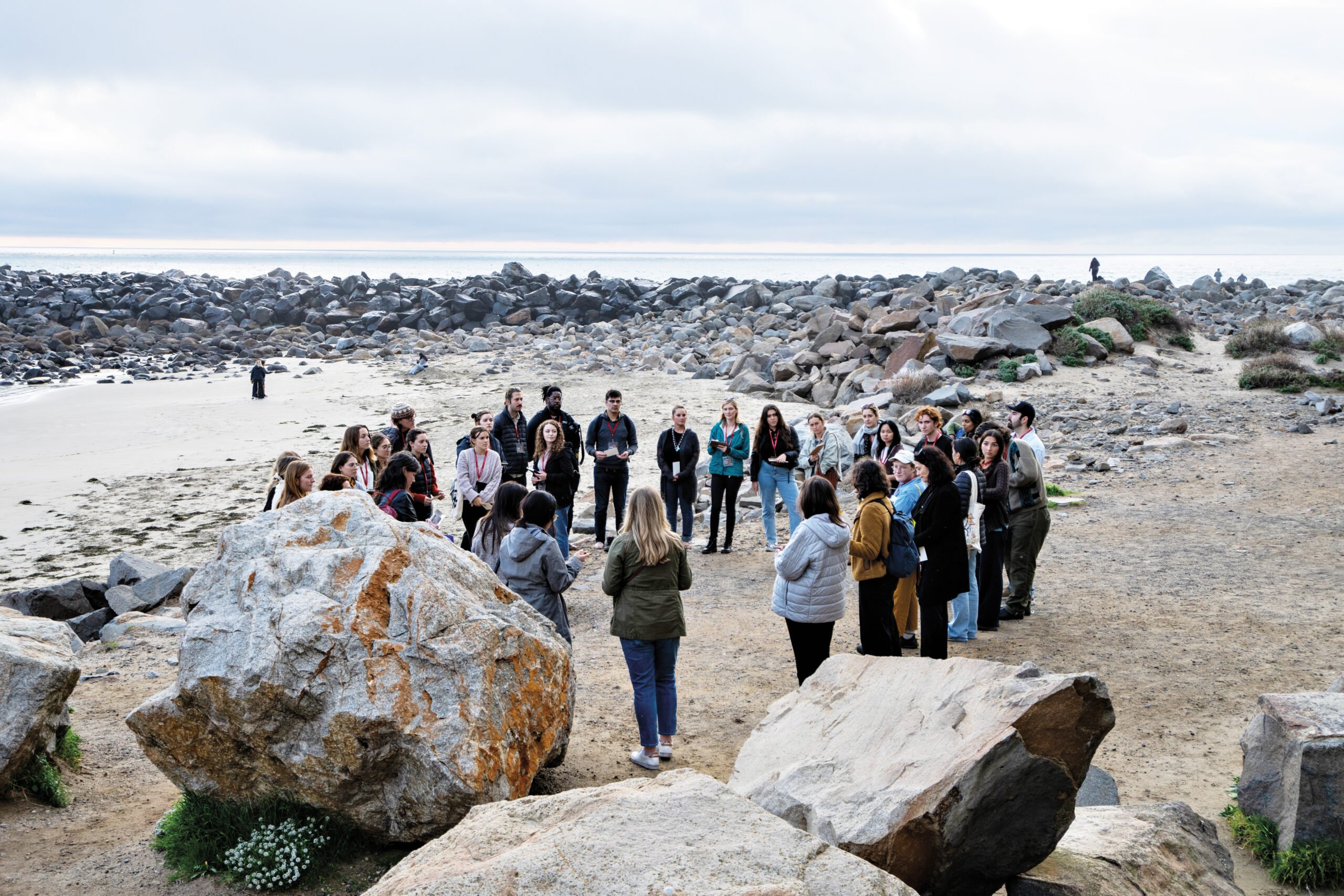 A group of students and designers gather in Morro Bay California