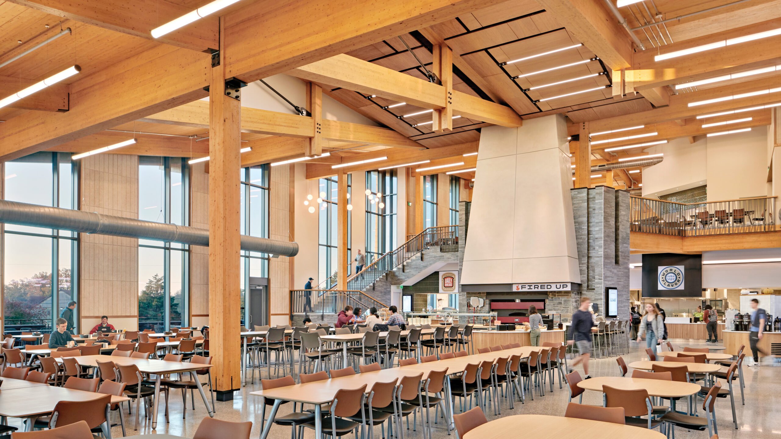 A mass timber dining and commons building in a higher education project